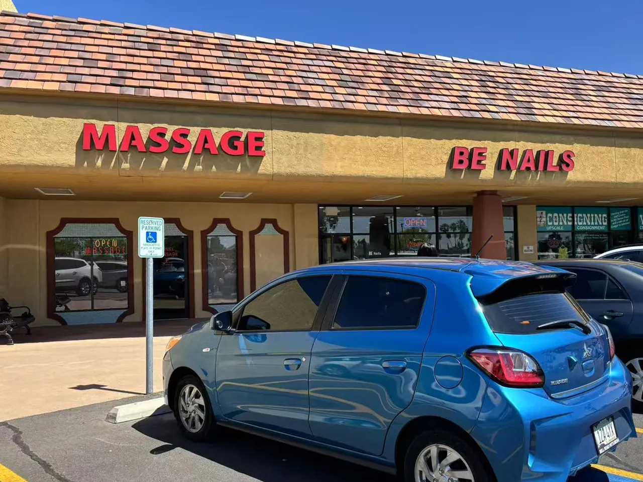 Storefront of Angel Massage Spa on W Bell Rd in Sun City, AZ, with the red MASSAGE sign