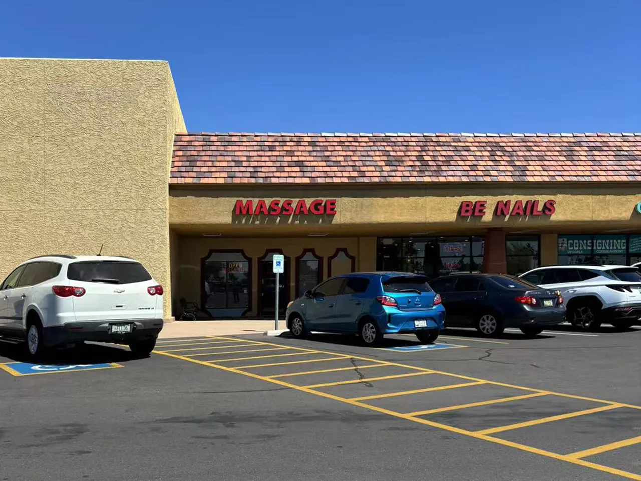 Plaza and parking lot in front of Angel Massage Spa on W Bell Rd in Sun City, AZ